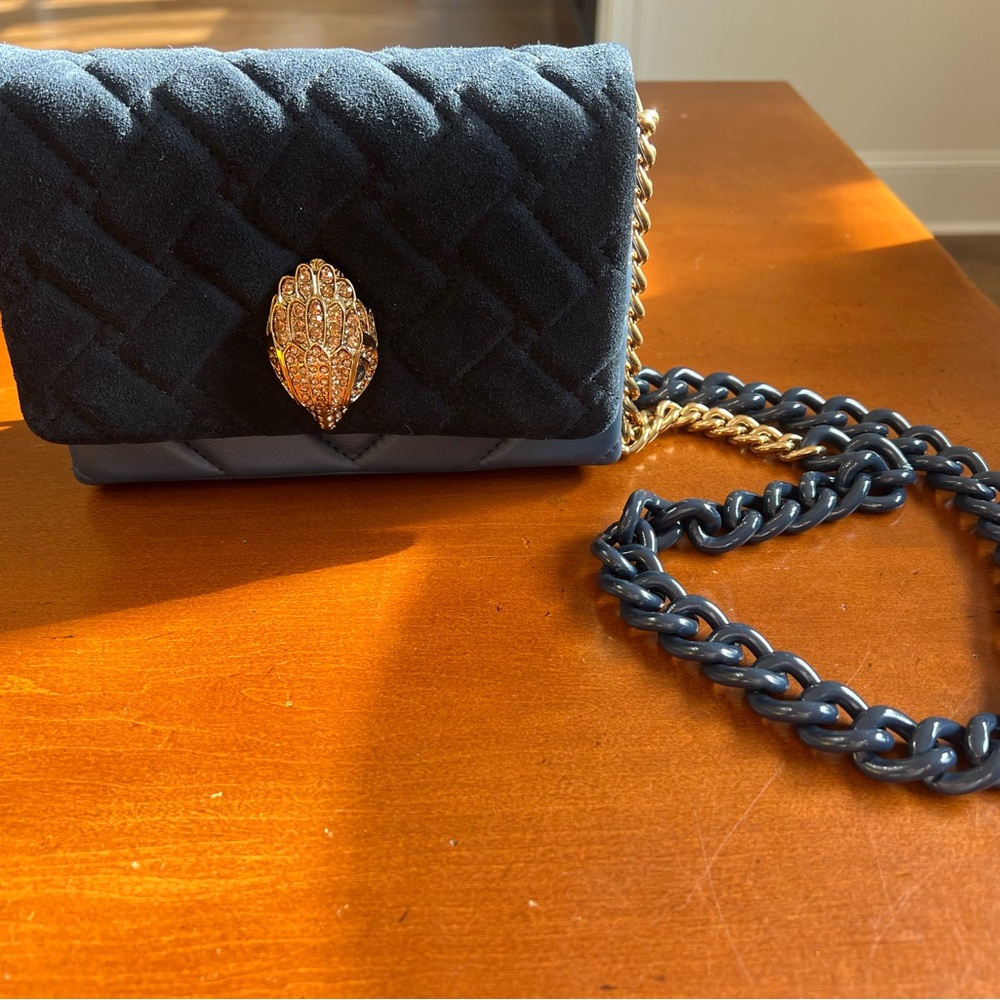 Kurt Geiger leather handbag. Like new.
8” L X 5” H X 2.5” W.